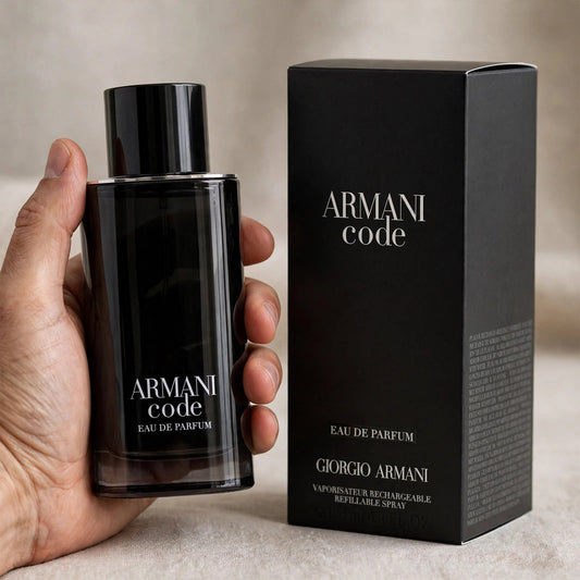 Armani Code Eau de Parfum bottle held in hand