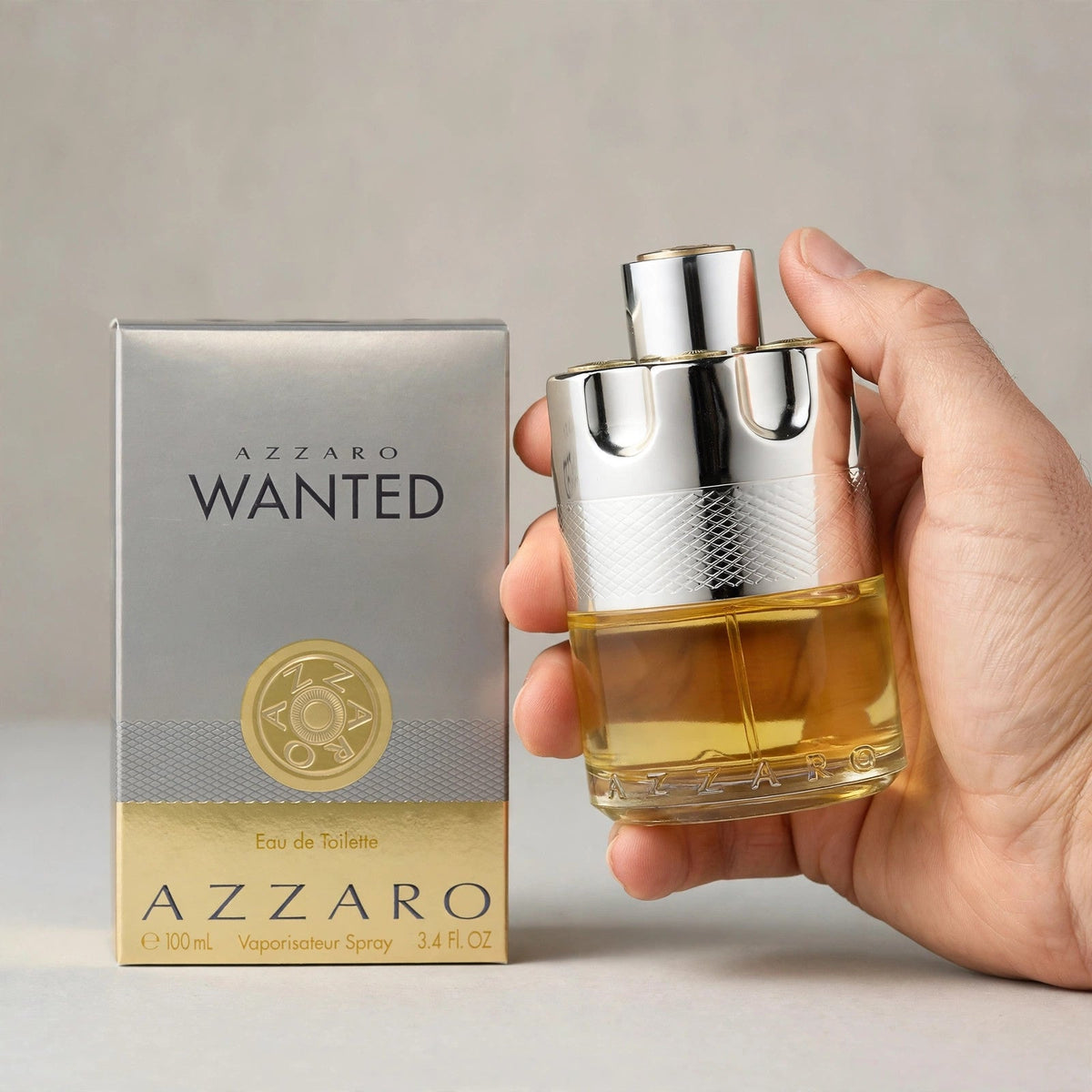 Azzaro Wanted Eau de Toilette 100ml bottle held in hand