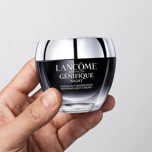 Lancôme Advanced Génifique Repairing Night Cream held in hand