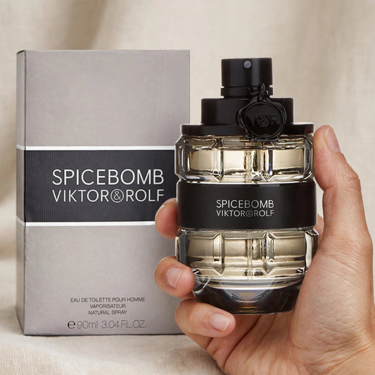 Hand holding Viktor & Rolf Spicebomb EDT perfume bottle